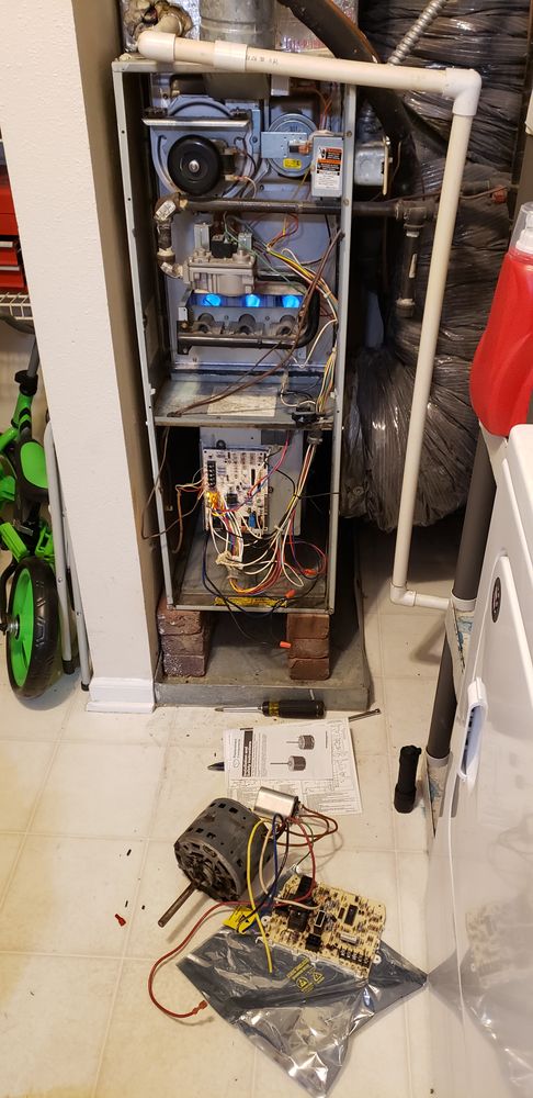 Open gas furnace during fan motor and control board service