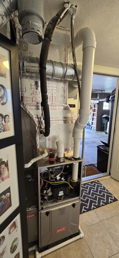 High-efficiency gas furnace with venting